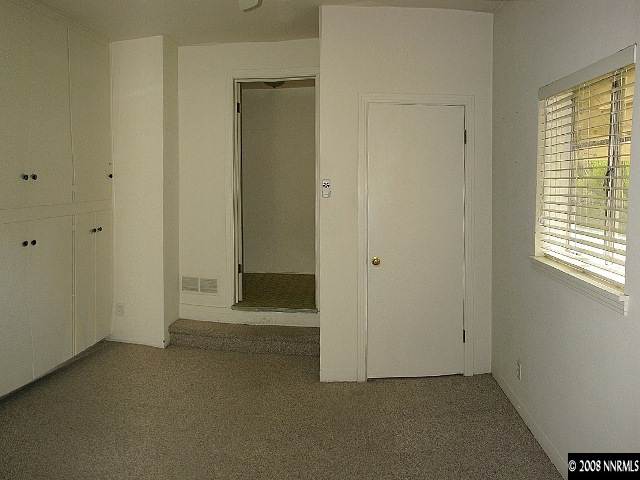 690 Georgia Place Reno, NV 89509 - Photo 6 of 9 an empty room with windows