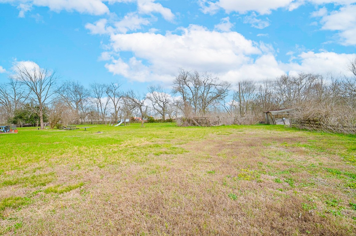 34520 Fulshear Farms Road Fulshear, TX 77441 - Photo 15 of 19 a view of yard with swimming pool and green space