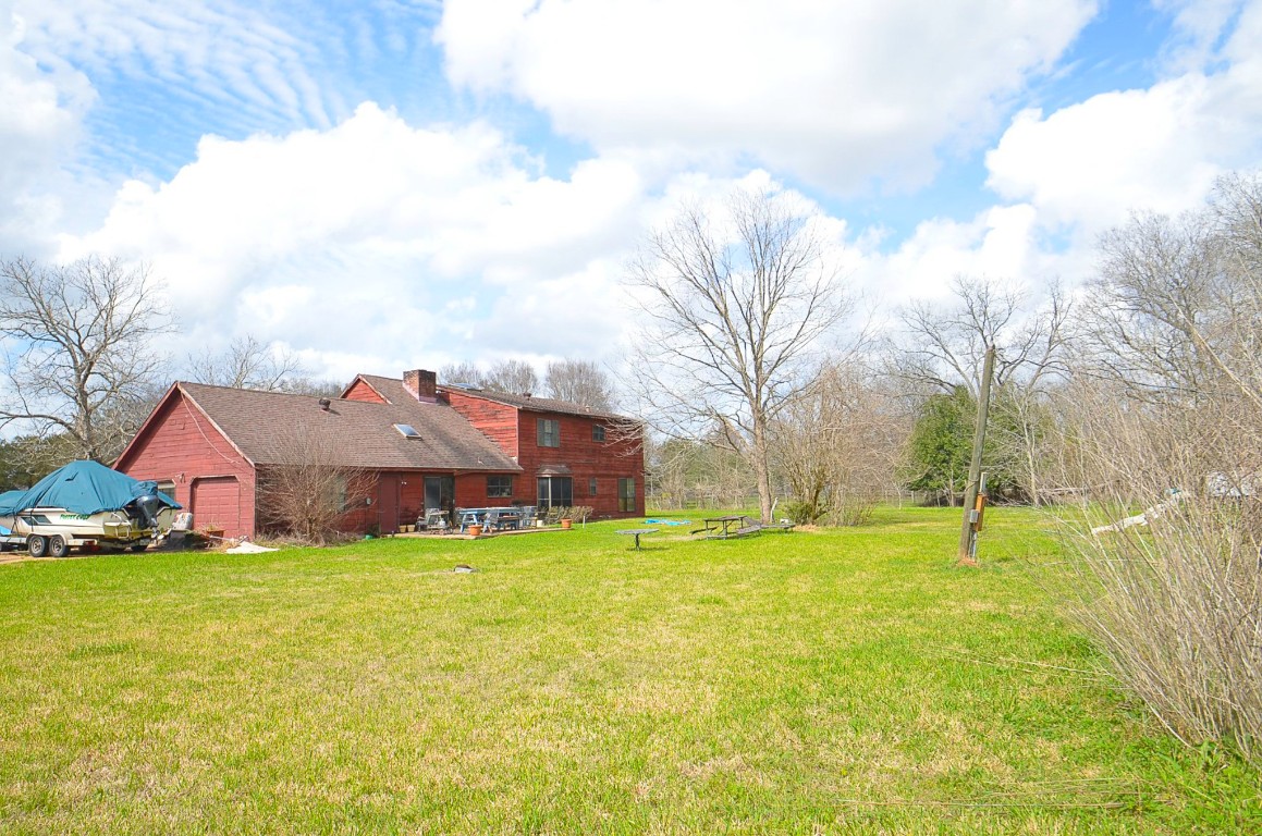 34520 Fulshear Farms Road Fulshear, TX 77441 - Photo 16 of 19 a view of a town with large trees