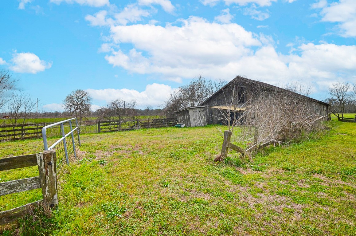 34520 Fulshear Farms Road Fulshear, TX 77441 - Photo 18 of 19 a view of an house with backyard
