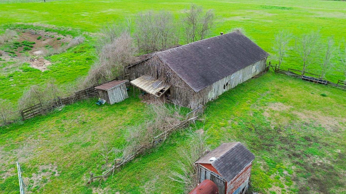 34520 Fulshear Farms Road Fulshear, TX 77441 - Photo 7 of 19 a view of a house with a yard