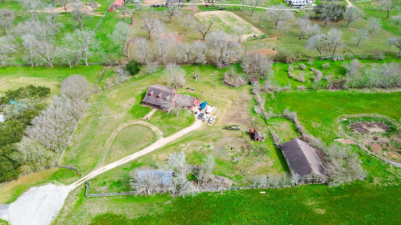 34520 Fulshear Farms Road Fulshear, TX 77441 - Photo 8 of 19 an aerial view of a house with a yard and lake