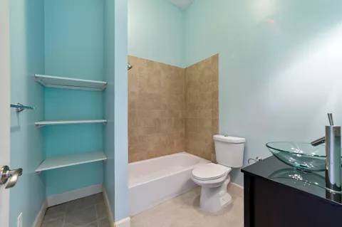 a view of a swimming pool with an outdoor space and seating area