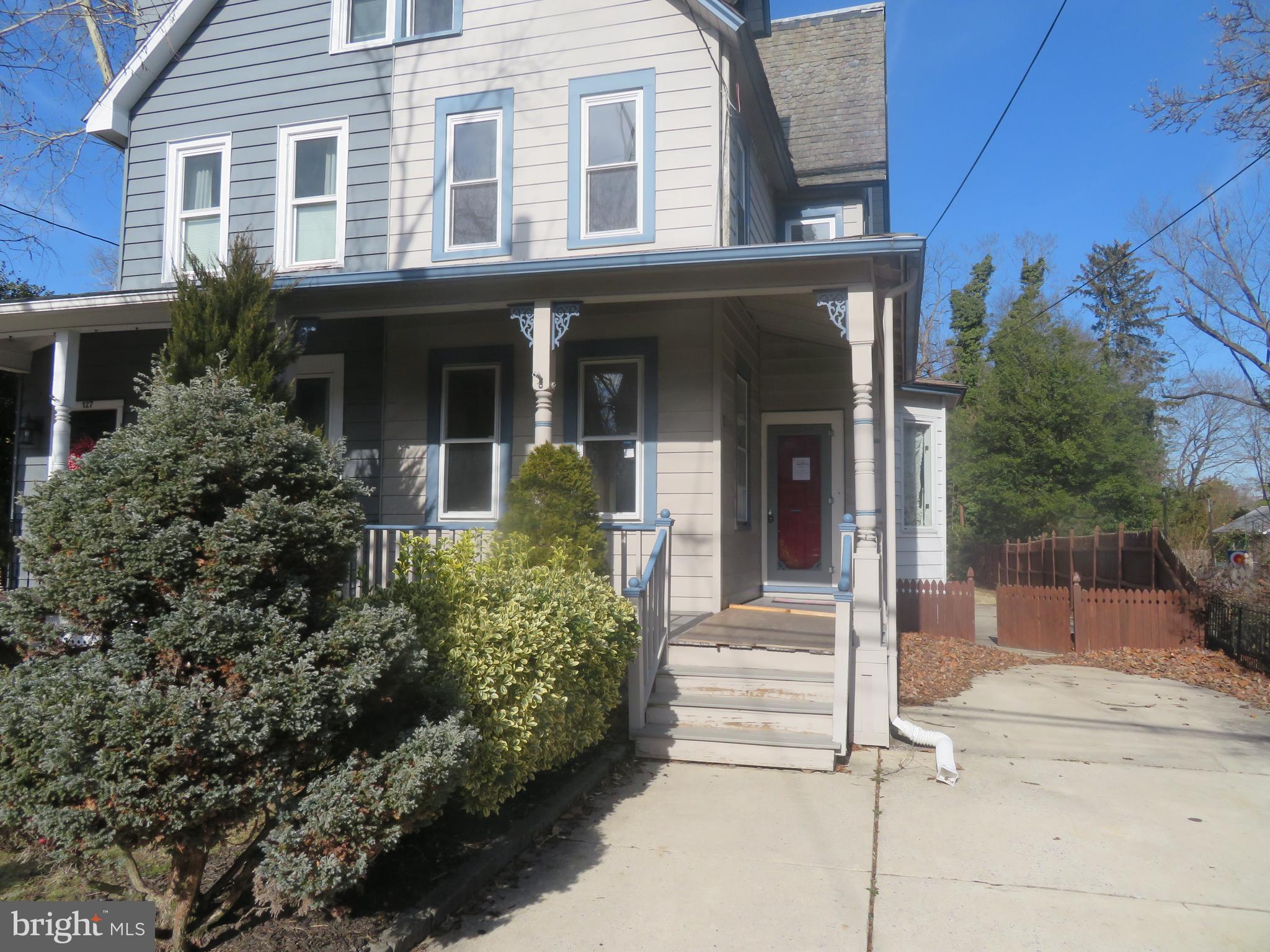 125 West Cottage Avenue Haddonfield, NJ 08033 - Photo 2 of 38 front view of a house with a yard