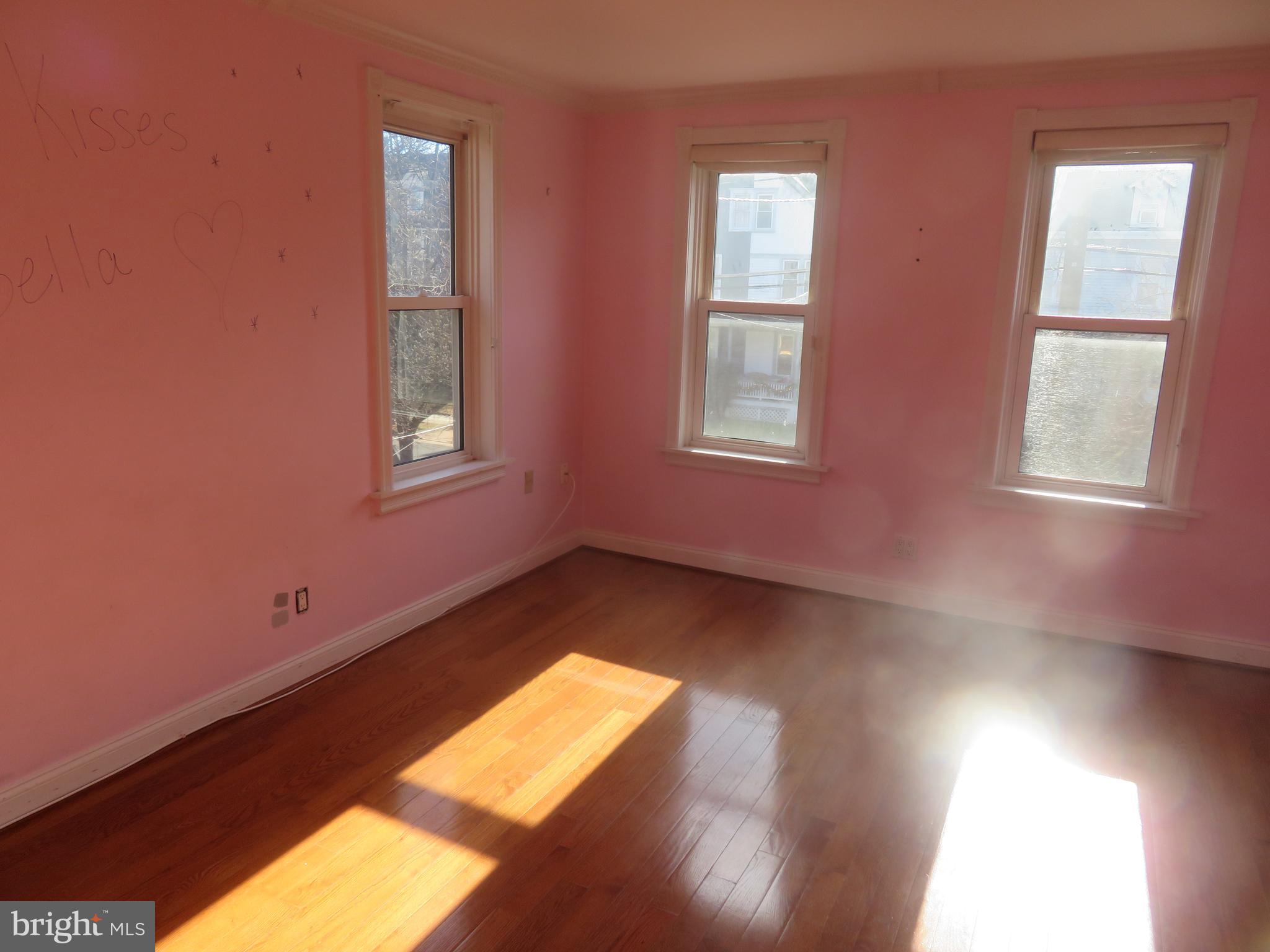 125 West Cottage Avenue Haddonfield, NJ 08033 - Photo 23 of 38 a view of empty room with wooden floor and fan