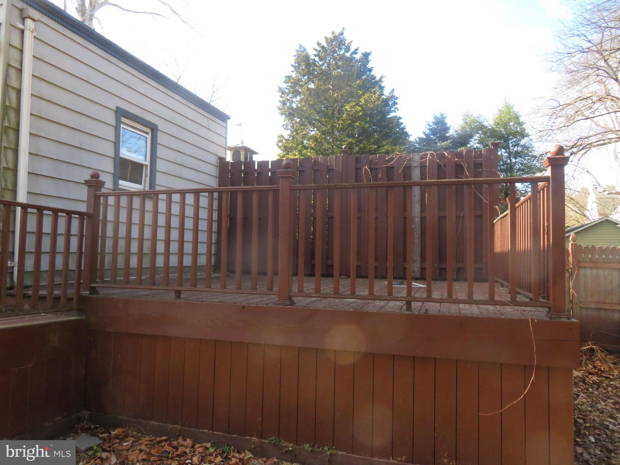 125 West Cottage Avenue Haddonfield, NJ 08033 - Photo 34 of 38 a view of a house with a wooden fence