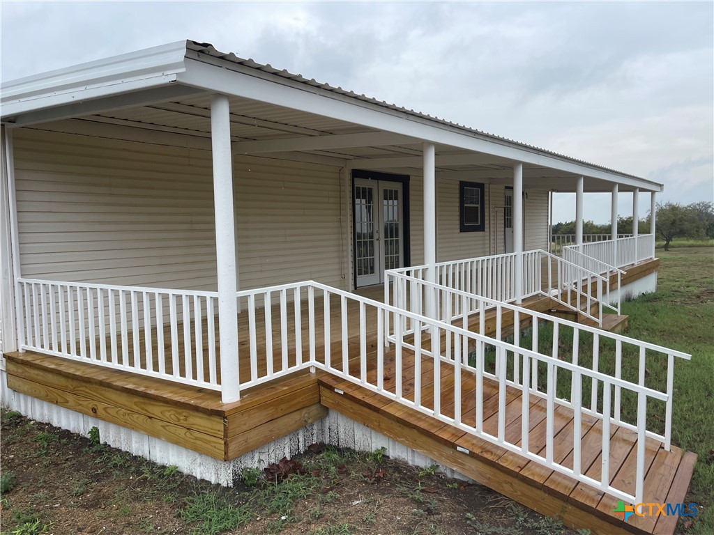 60 County Road 304 Goldthwaite, TX 76844 - Photo 15 of 23 a view of a house with wooden deck
