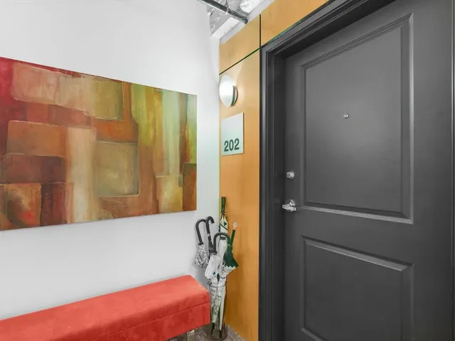 a bathroom with a tub and shower