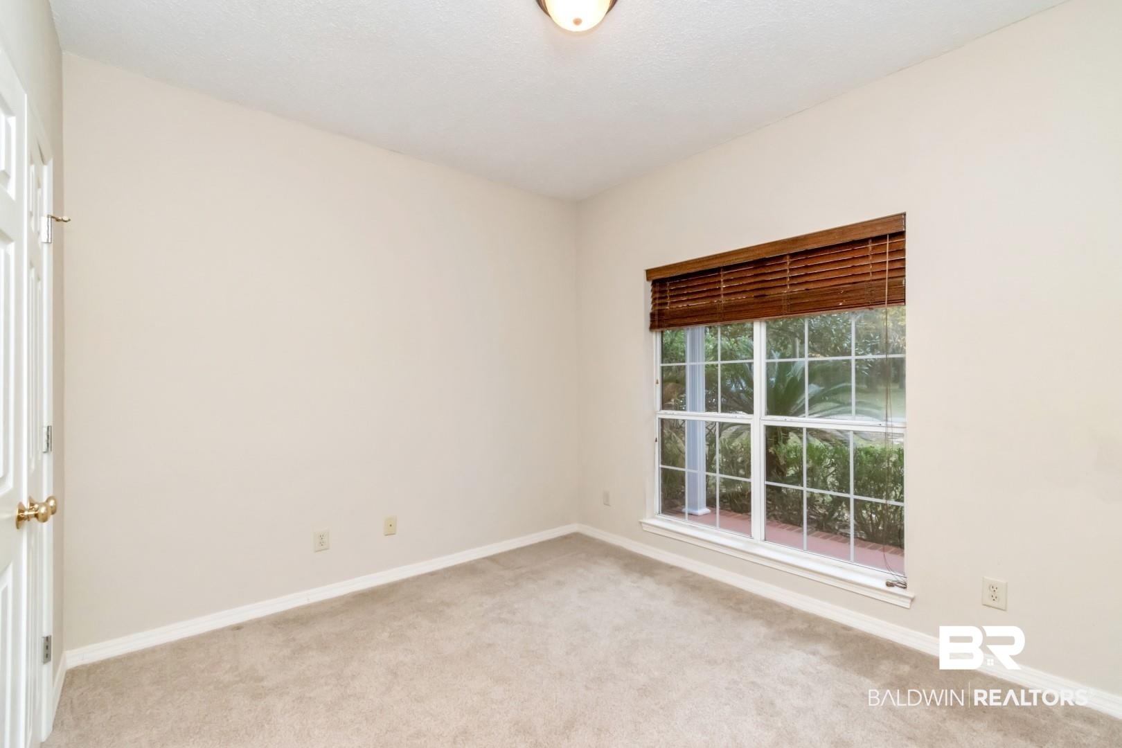152 Ideal Avenue Mobile, AL 36608 - Photo 26 of 32 Empty room with light carpet