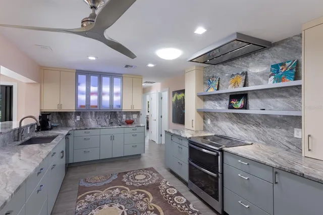 a view of a backyard with sitting area