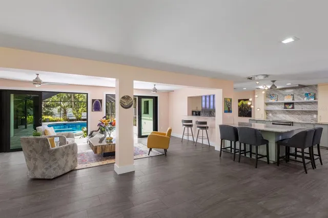 a view of a backyard with sitting area