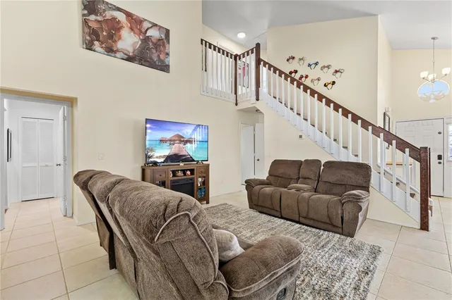 a living room with furniture and a couch