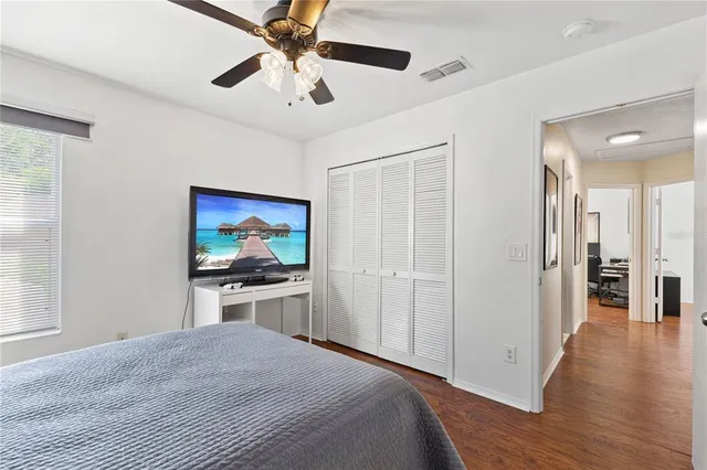 a view of a livingroom with furniture and a window