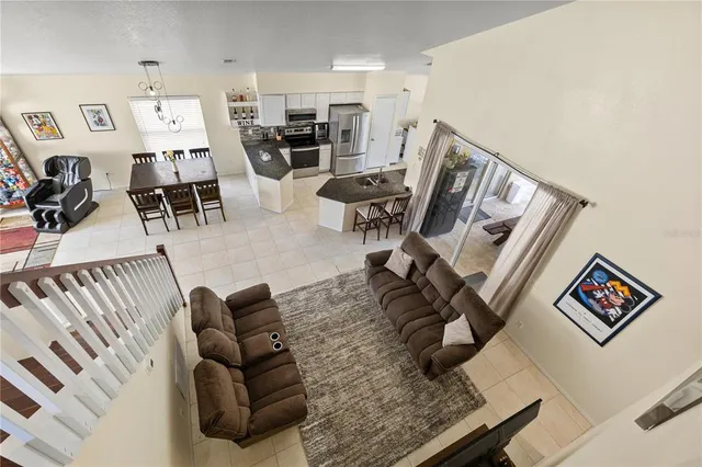 a view of a swimming pool with a patio