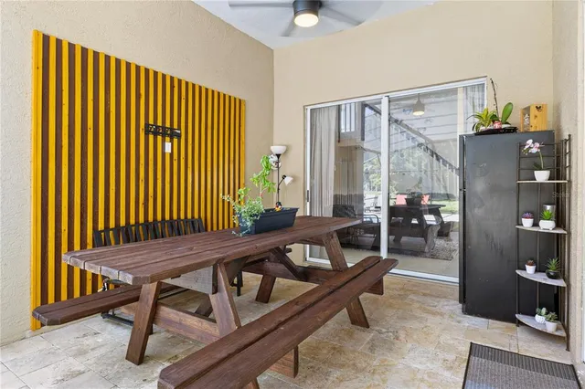 a front view of house with a garden and swimming pool