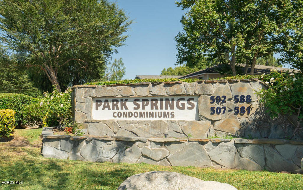 527 Spring Road, Unit 18 Moorpark, CA 93021 - Photo 2 of 6 a sign that is on the side of a road