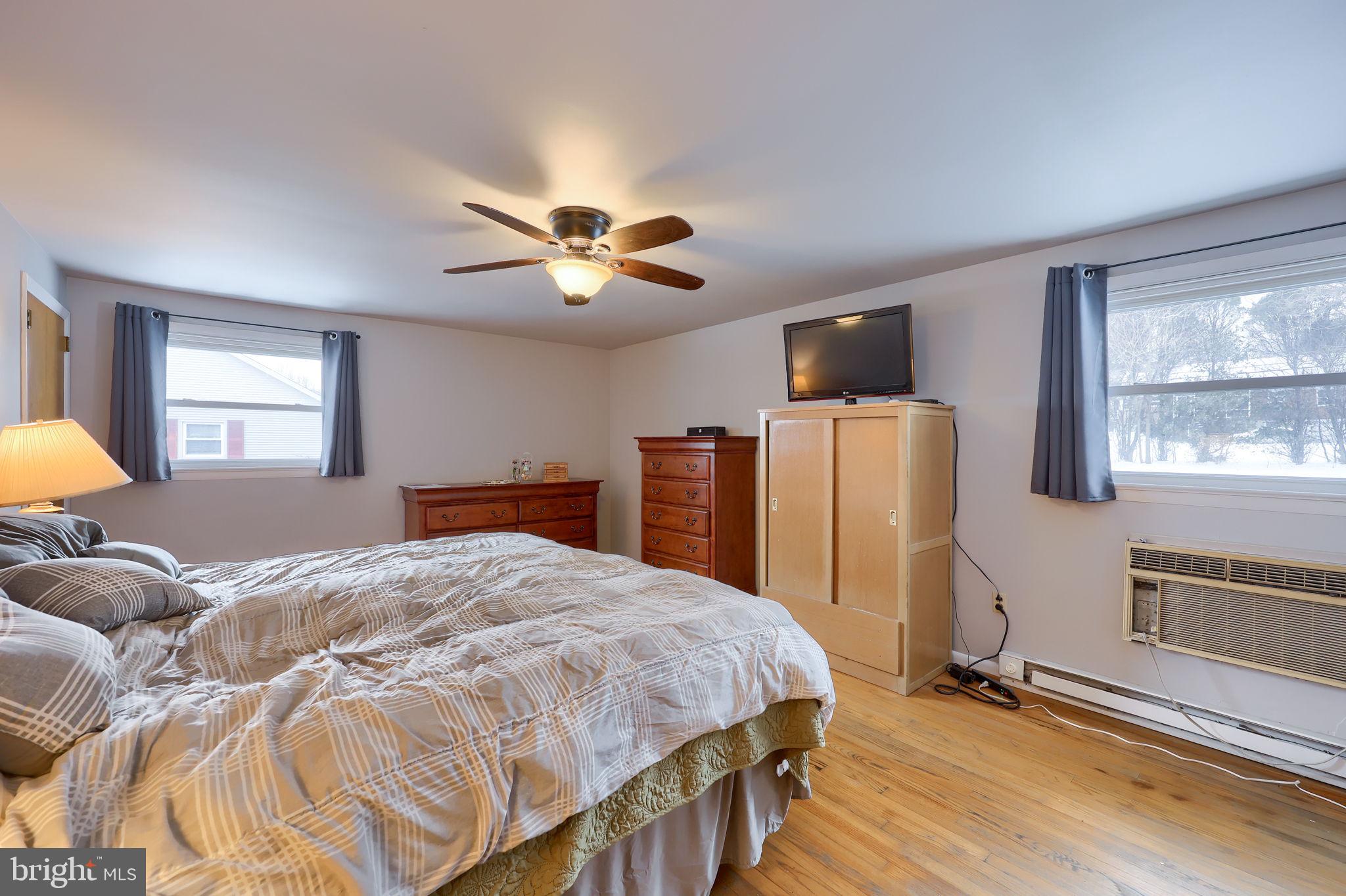 340 Primrose Avenue Lancaster, PA 17601 - Photo 26 of 47 a bedroom with a bed and a chandelier