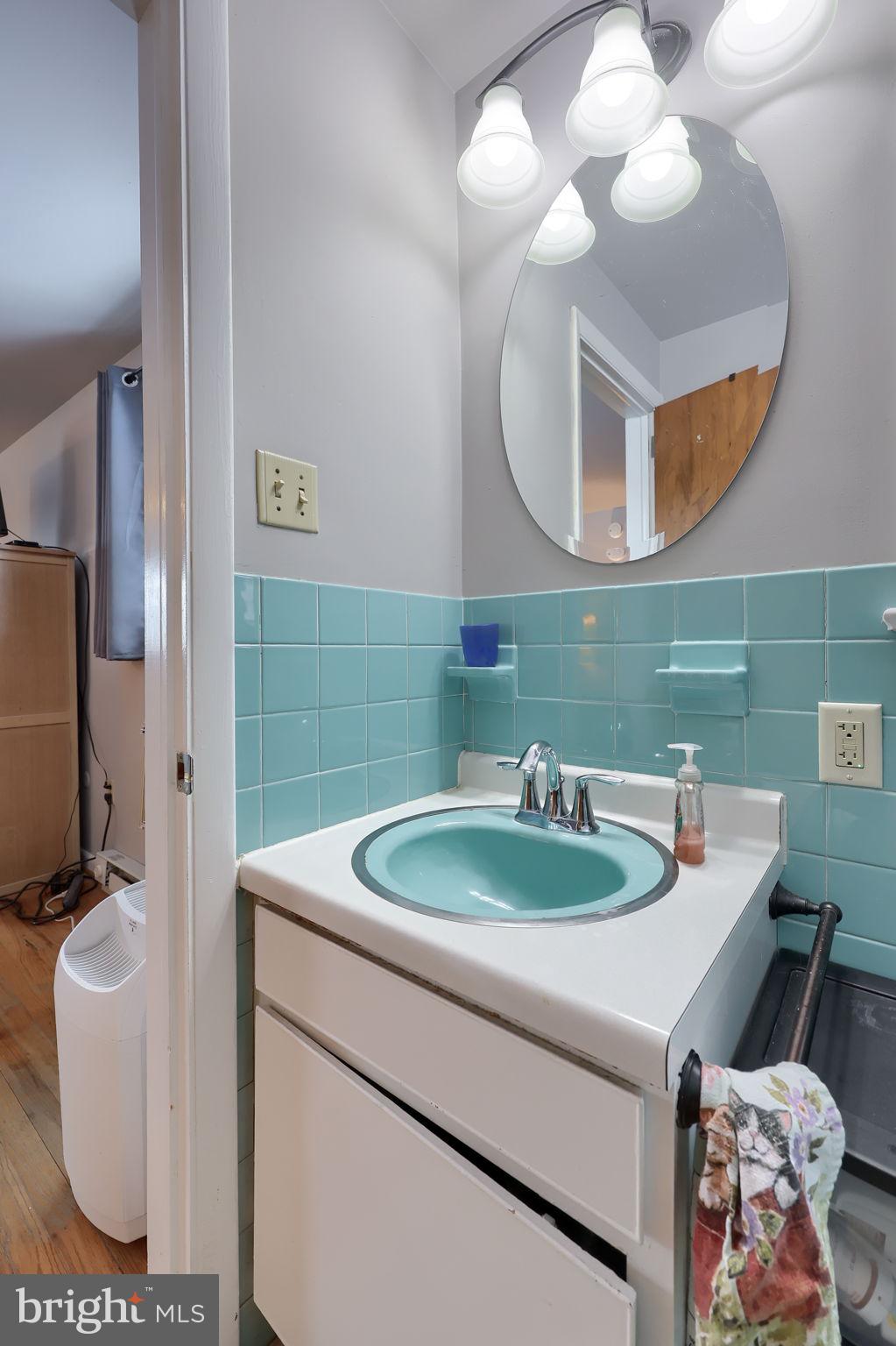 340 Primrose Avenue Lancaster, PA 17601 - Photo 27 of 47 a bathroom with a toilet sink and mirror