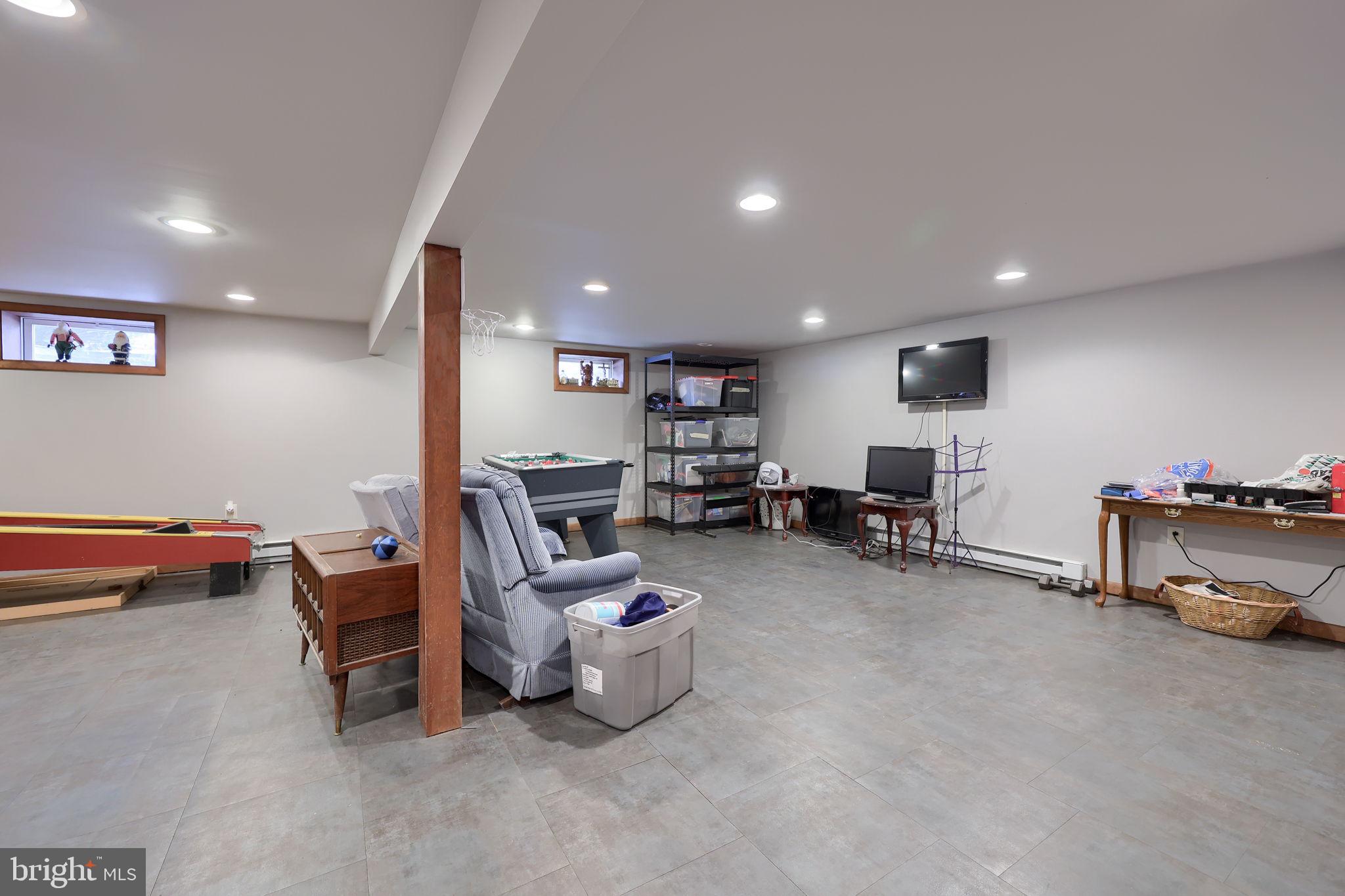 340 Primrose Avenue Lancaster, PA 17601 - Photo 31 of 47 a living room with furniture and a flat screen tv
