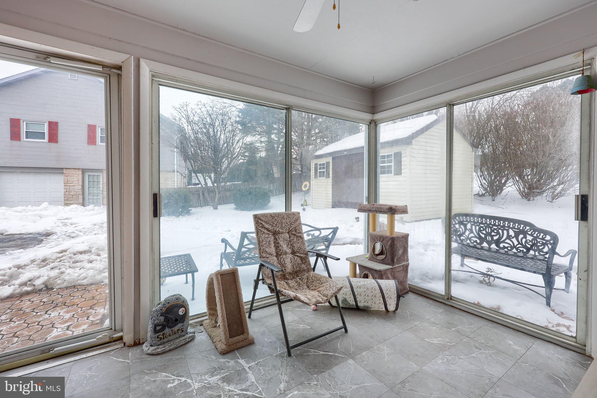 340 Primrose Avenue Lancaster, PA 17601 - Photo 40 of 47 a dining room with furniture and a floor to ceiling window