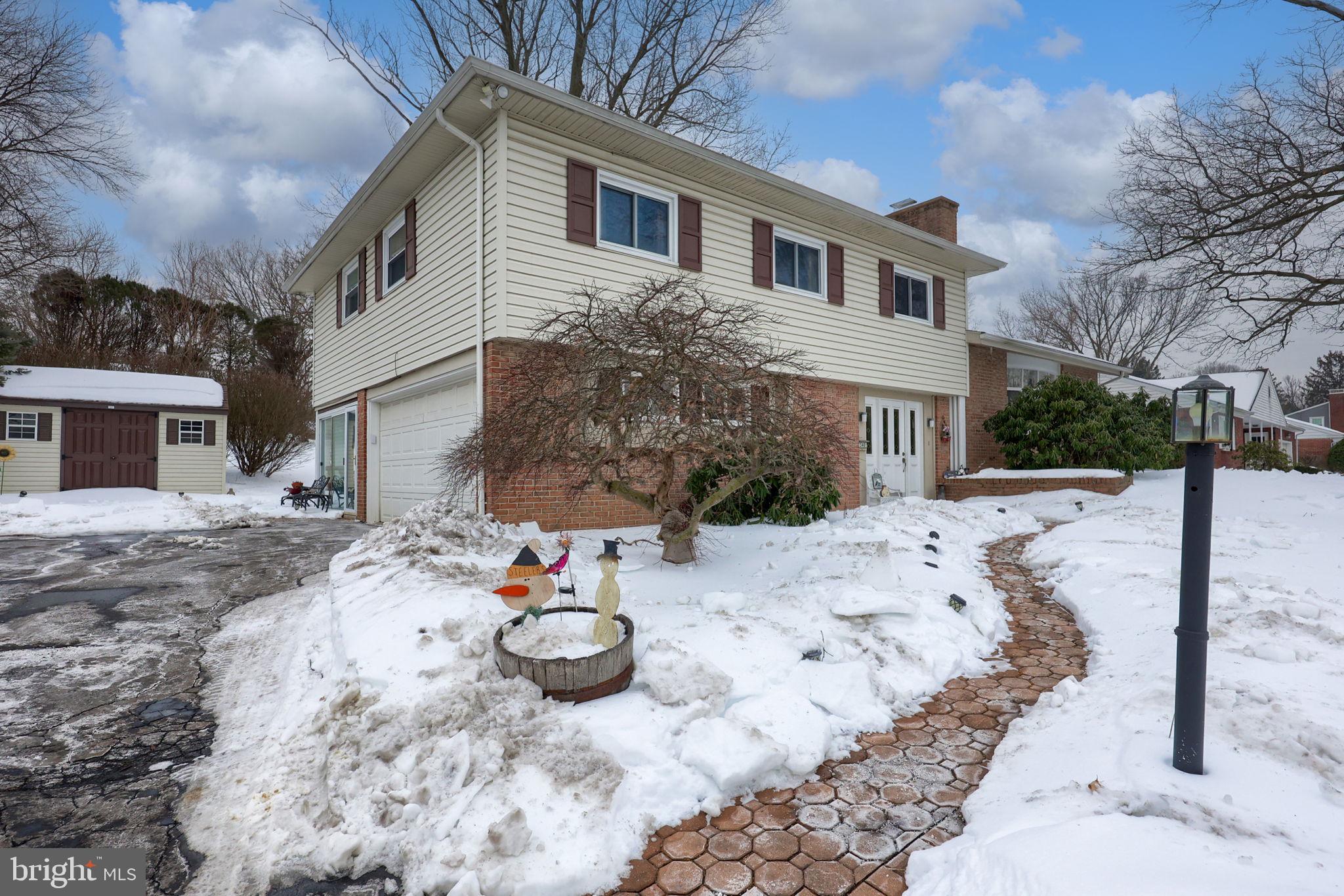 340 Primrose Avenue Lancaster, PA 17601 - Photo 43 of 47 a view of a white house with a snow on the road