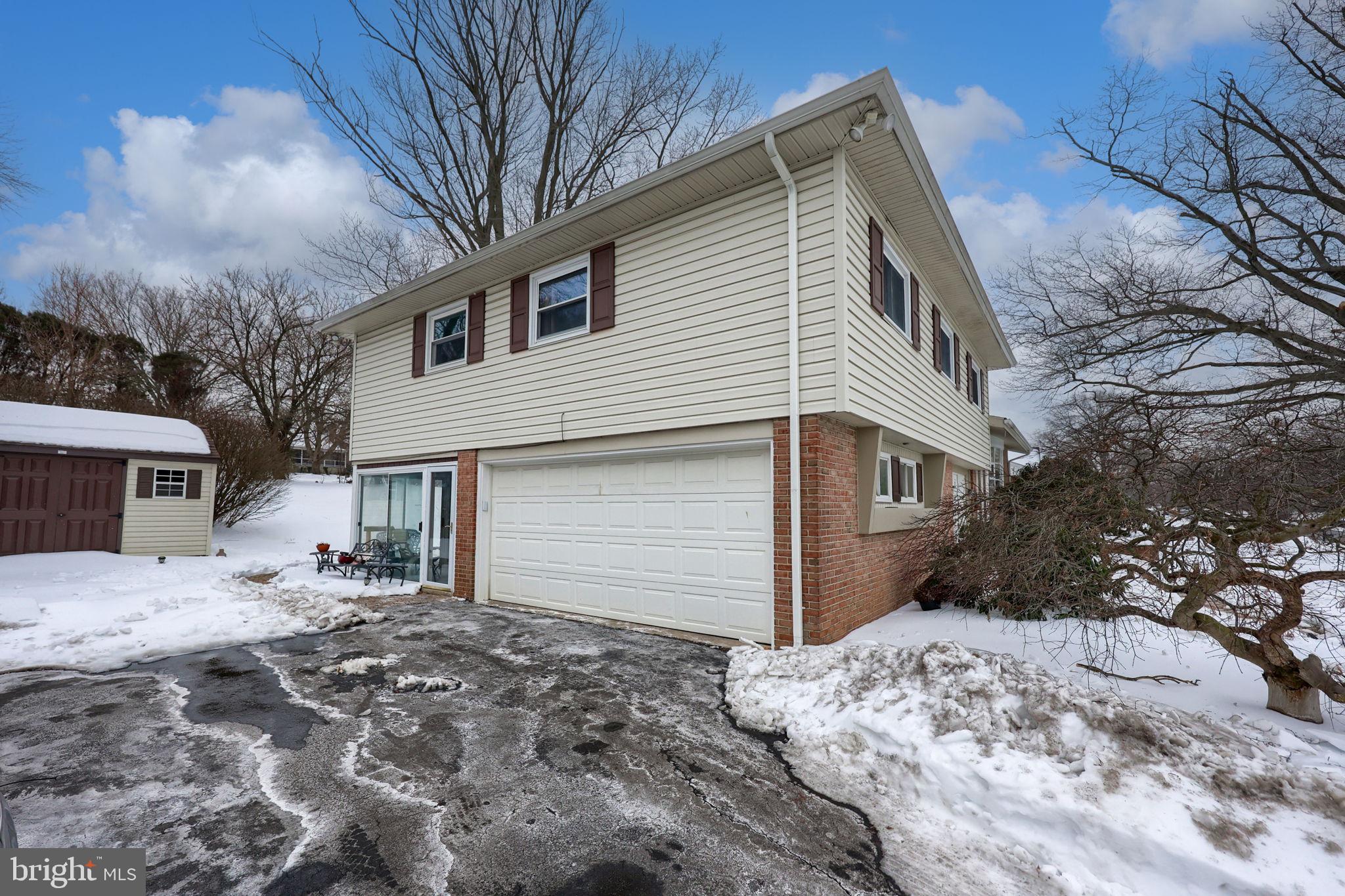 340 Primrose Avenue Lancaster, PA 17601 - Photo 44 of 47 a view of a house with a yard covered in snow