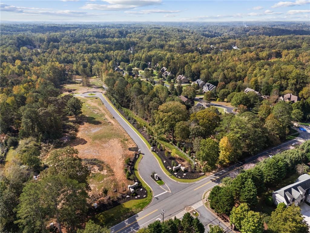 2785 Francis Road Alpharetta, GA 30004 - Photo 4 of 8 an aerial view of residential houses with outdoor space