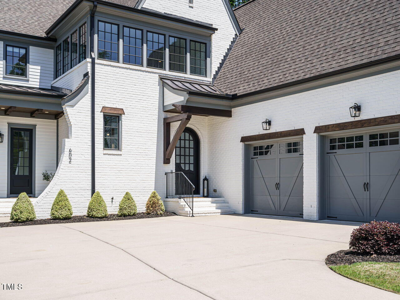 602 Shelley Road Raleigh, NC 27609 - Photo 5 of 64 a view of a building with car parked