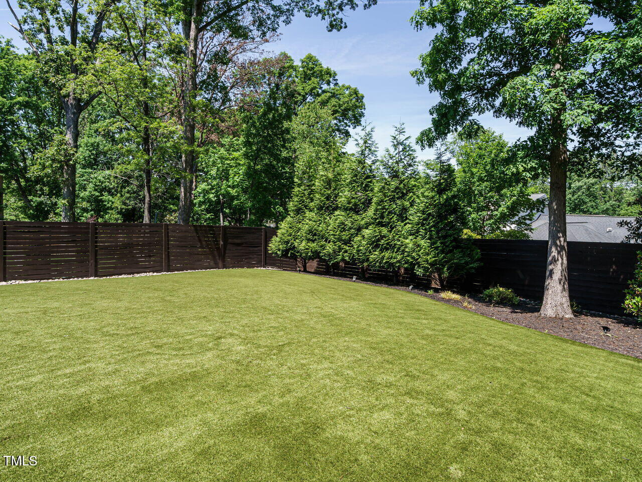 602 Shelley Road Raleigh, NC 27609 - Photo 60 of 64 a view of a backyard