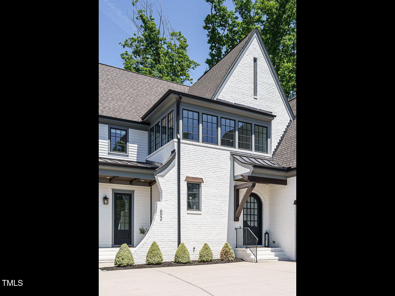 602 Shelley Road Raleigh, NC 27609 - Photo 7 of 64 a house view with a outdoor space