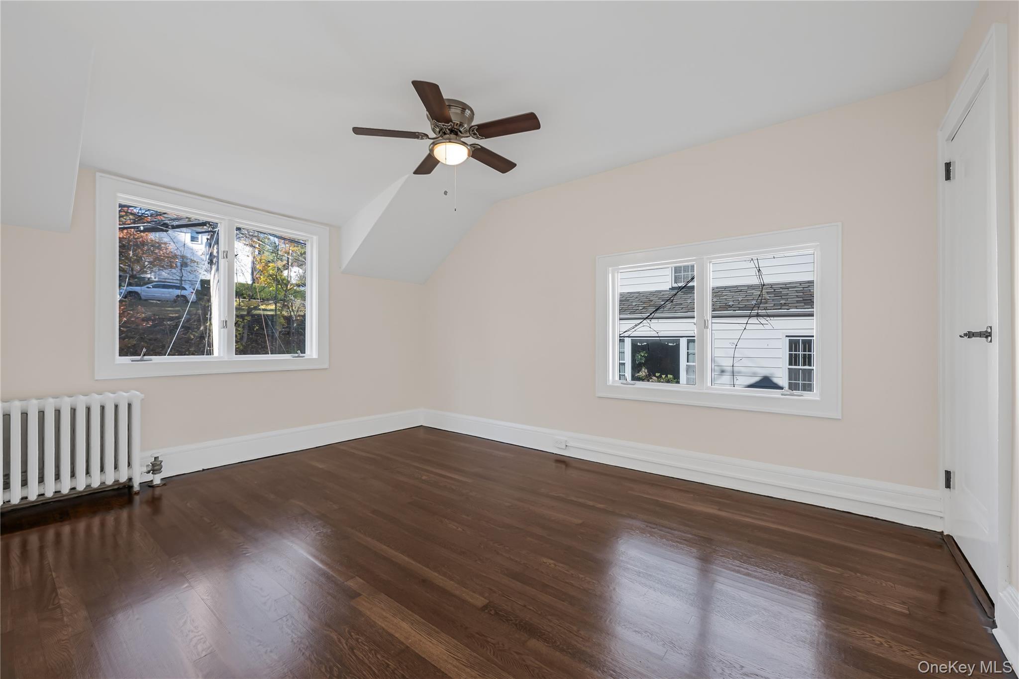 39 Hillcrest Road Hartsdale, NY 10530 - Photo 26 of 42 a view of empty room with wooden floor and fan