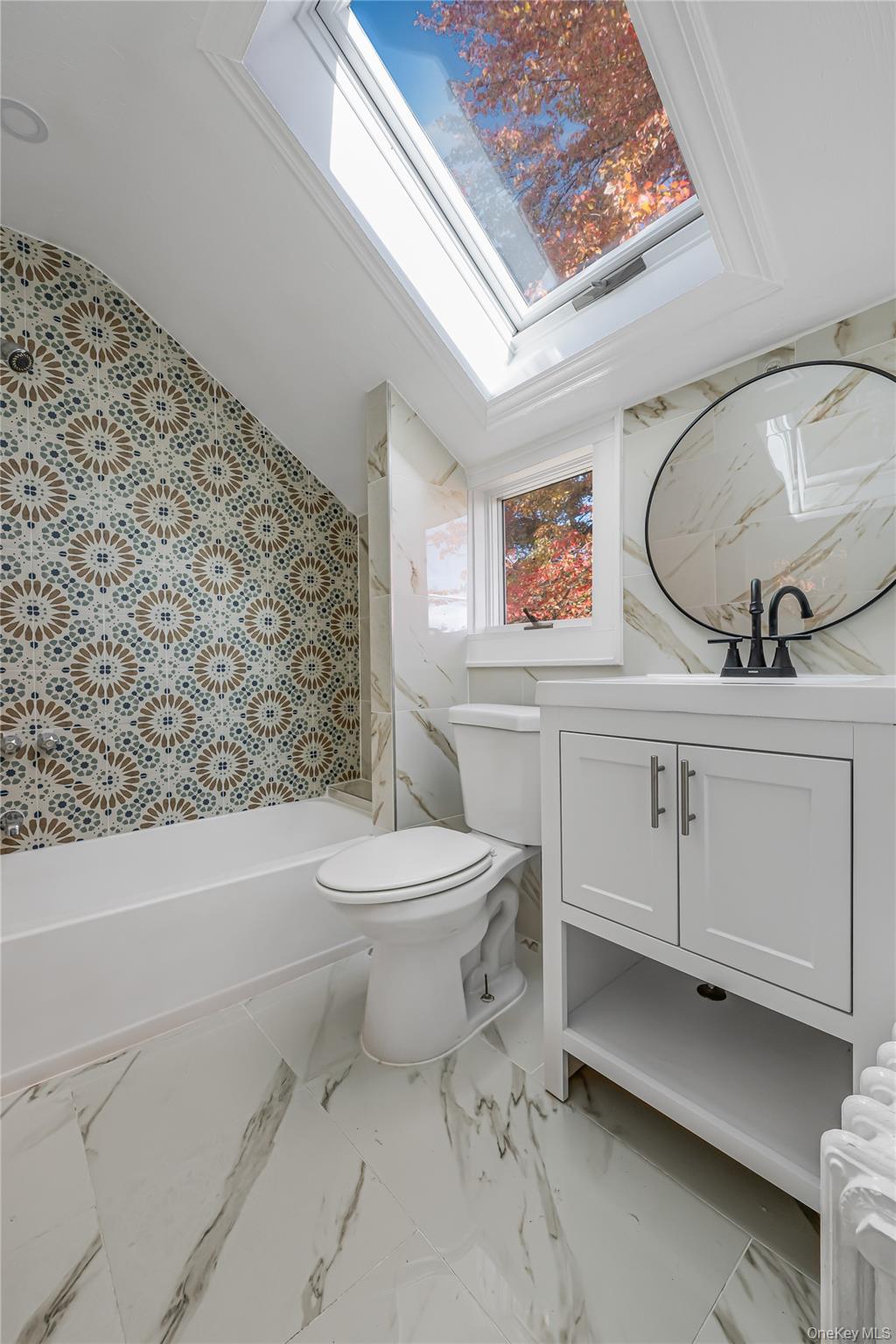 39 Hillcrest Road Hartsdale, NY 10530 - Photo 31 of 42 a bathroom with a toilet sink and mirror