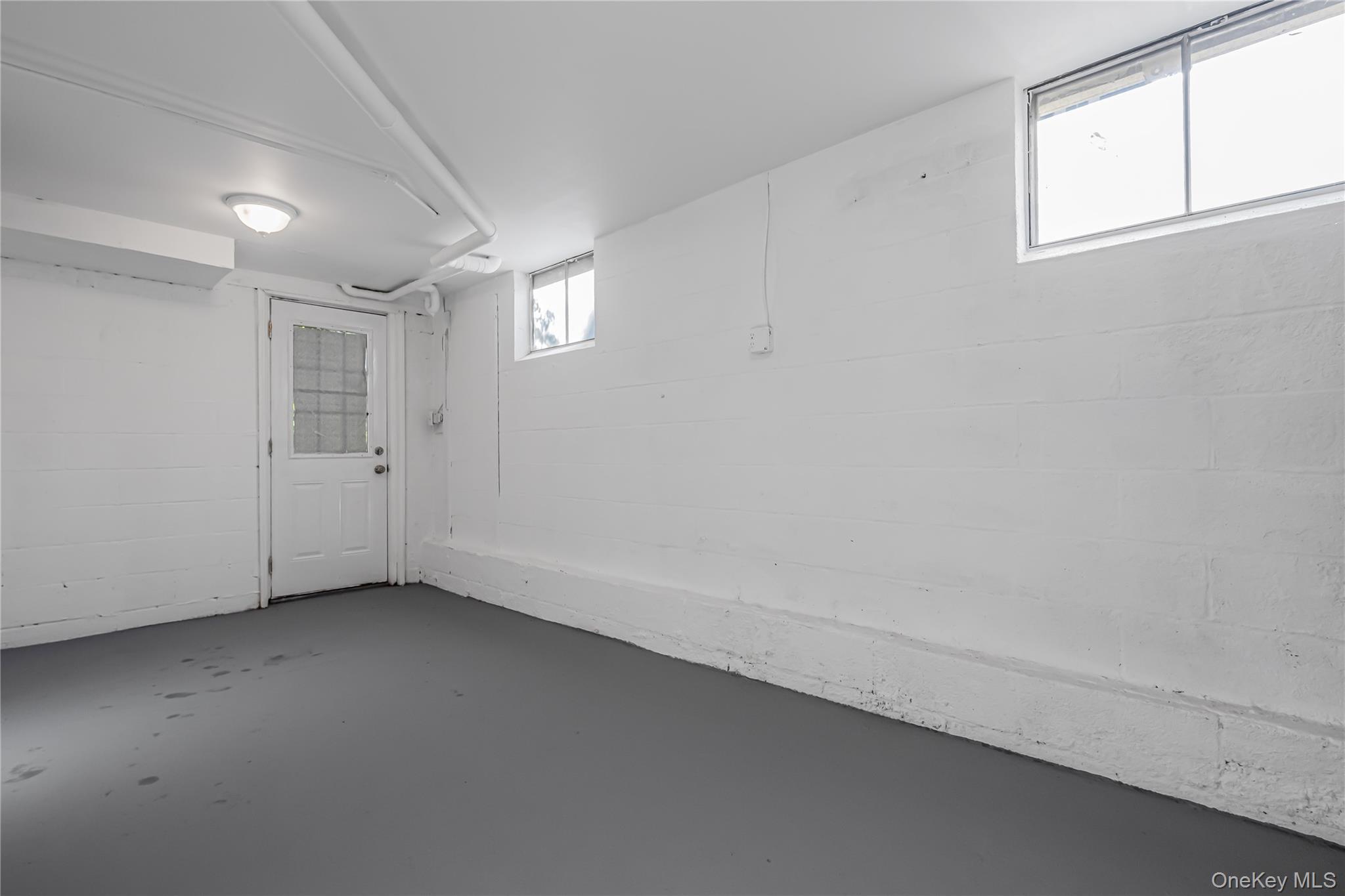 39 Hillcrest Road Hartsdale, NY 10530 - Photo 34 of 42 an empty room with windows