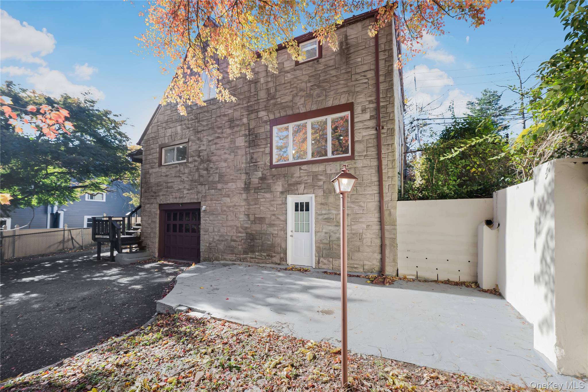 39 Hillcrest Road Hartsdale, NY 10530 - Photo 39 of 42 a brick building with a large windows