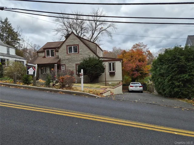 a house view with a street