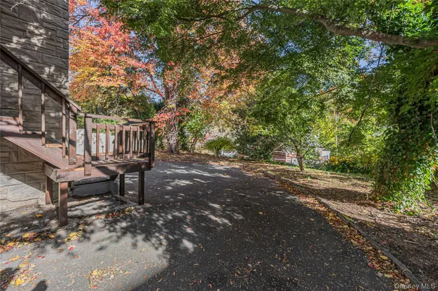 a view of a bench in a backyard
