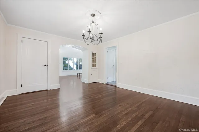 a view of a livingroom with wooden floor