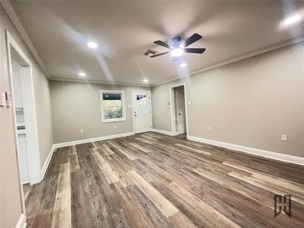 a view of an empty room and window