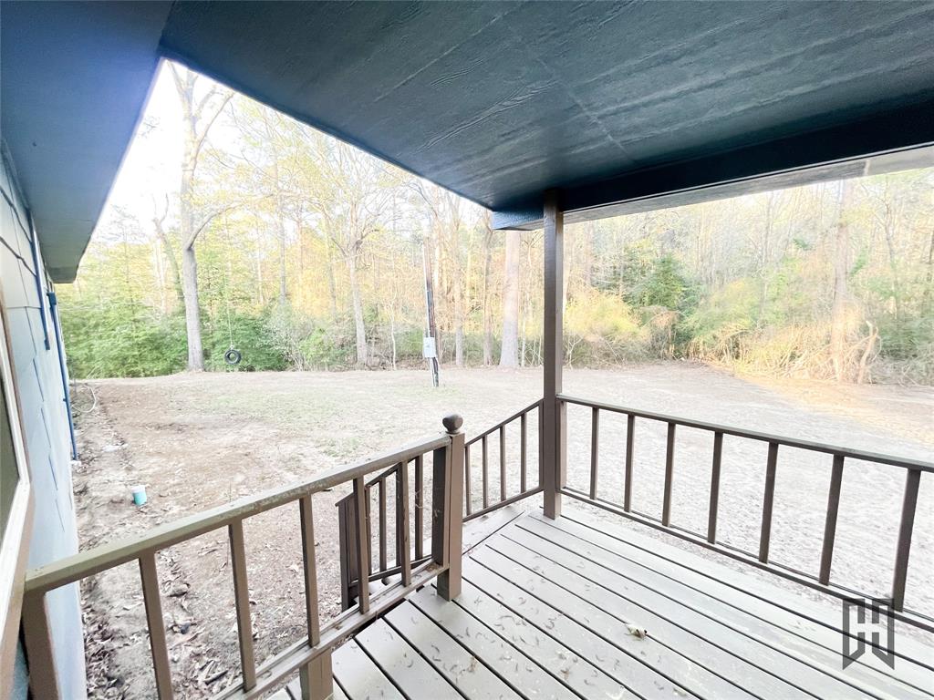 183 Beech Springs Road Minden, LA 71055 - Photo 26 of 28 a view of balcony with wooden floor