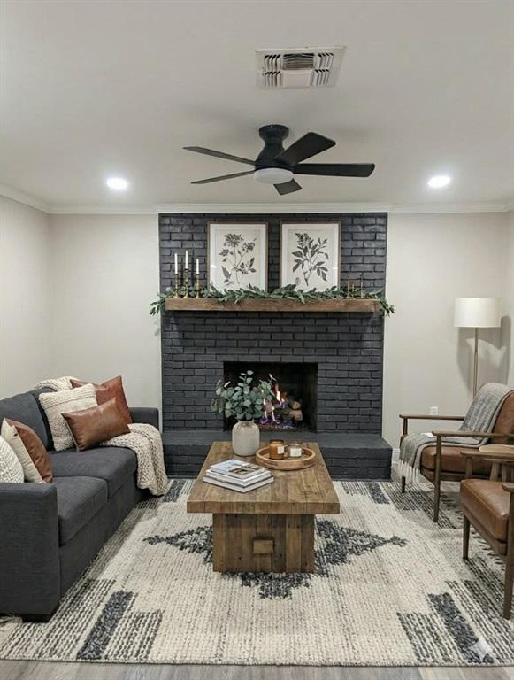 183 Beech Springs Road Minden, LA 71055 - Photo 5 of 28 a living room with furniture and a fireplace