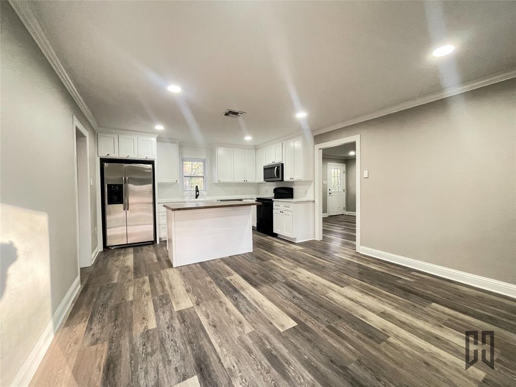 183 Beech Springs Road Minden, LA 71055 - Photo 6 of 28 a view of kitchen with wooden floor