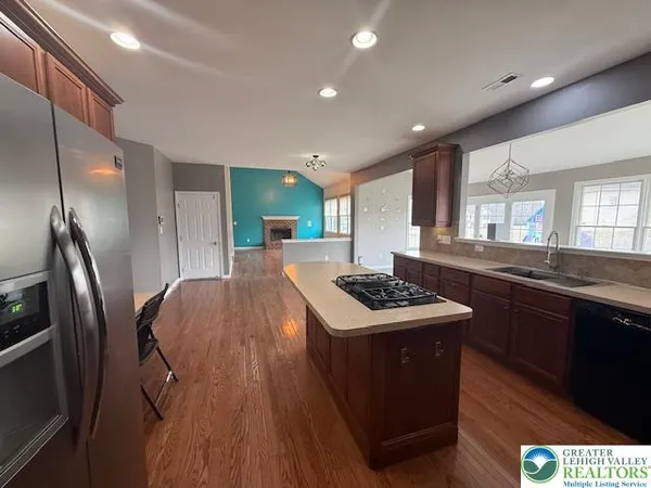 a utility room with a sink dryer and washer