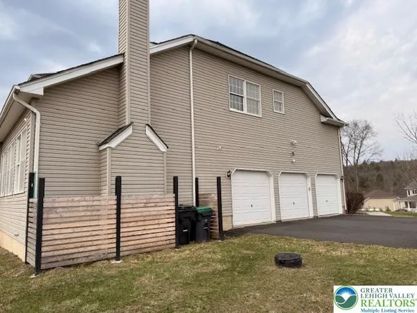 a kitchen with stainless steel appliances granite countertop a stove a sink dishwasher and a refrigerator