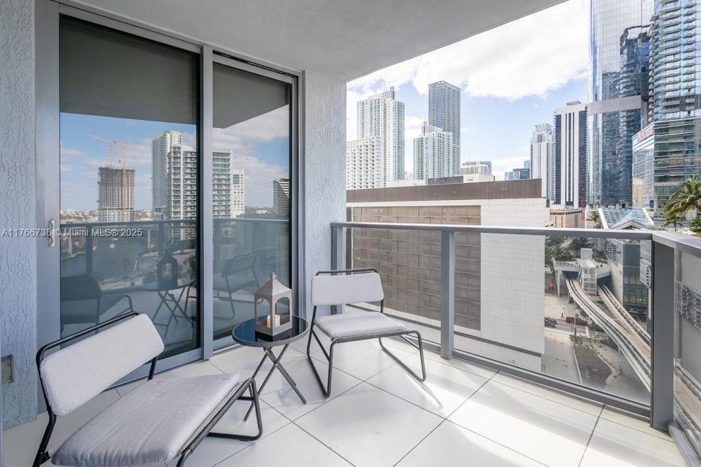 31 Southeast 6th Street, Unit 1601 Miami, FL 33131 - Photo 11 of 14 a bathroom with a bathtub and a shower