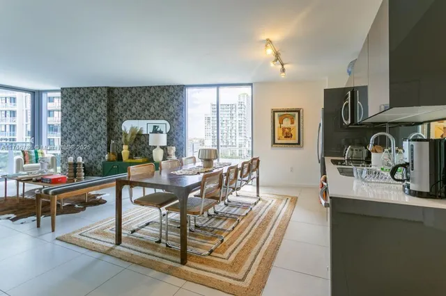 a view of a livingroom with furniture and a table