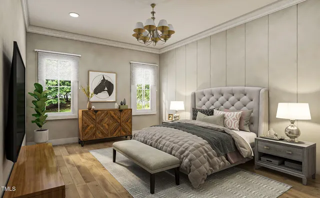 a bedroom with a large bed and a window