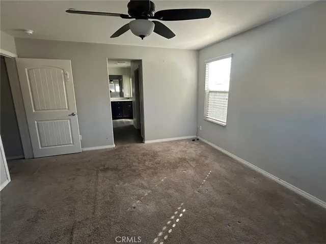 a bathroom with a vanity and a mirror