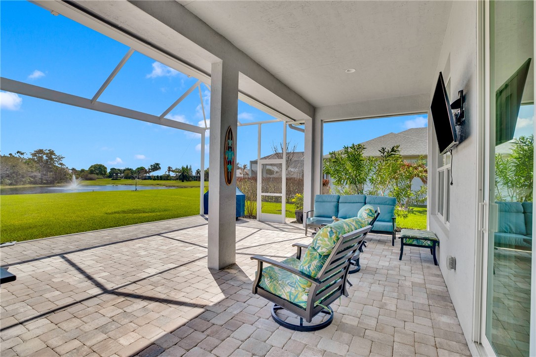 105 Night Hawk Way Sebastian, FL 32958 - Photo 29 of 36 a building outdoor space with seating space and garden view