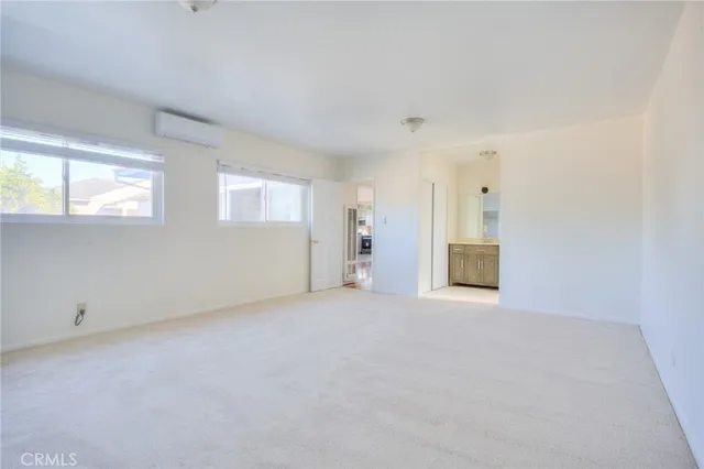 a bathroom with a toilet and a bathtub