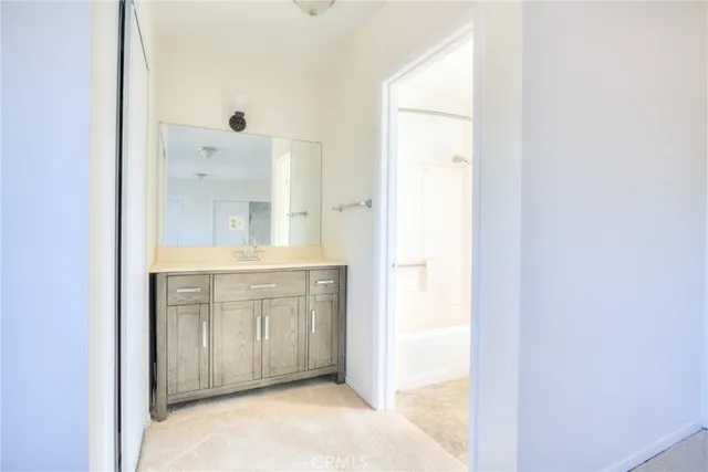 an empty room with a empty space and a window